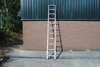 A stepladder leaning against a wall