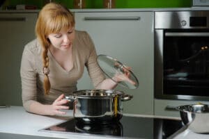 a young lady cooking