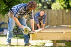 two-men-busy-with-their-outdoor-project
