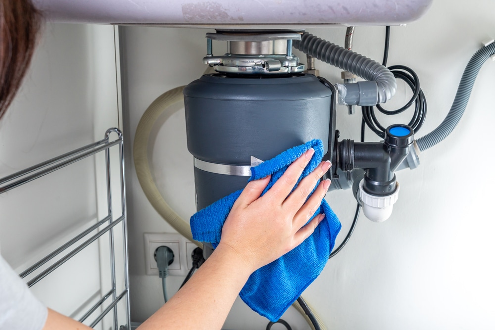 how to clean a waste disposal unit